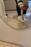 They fit true to size for 6.5. The heel feels comfy, and not too high. Good looking. Suitable for office jobs. They can be styled with jeans or a dress. See pics. - Tanya S.