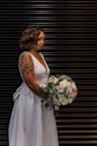 A little long but very nice! The material is good. I had to really steam it when it arrived. However, it's the best wedding dress for me. - Sofia O.