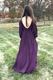 This dress made me feel like a princess and I never wanted to take it off! I ordered an XS because it was the only one they had in the color I wanted and though it was tough to zip I'd rather struggle to get it on than not have the dress at all. It did run a little long (I wore 3-inch heels and still would step on it occasionally so I just kept some of it in my hand when walking or dancing). I wore fashion tape due to the low front and back with no issues. Though the sleeves were sheer, it was nice to have the extra material for a fall wedding and the dress kept me quite warm. Got so many compliments and can't wait to have an excuse to wear it again! - Katelyn N.