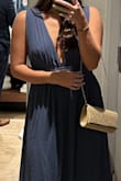 This dress was amazing for the event I was attending, I usually am a small but the medium fit me best. It is very long so I also had to get it tailored. Was so comfortable, doesn't wrinkle, and got tons of compliments! - Kali H.