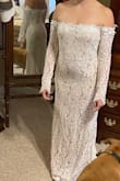Very very pretty, lacy dress. This was my runner-up dress certainly; it fit like a glove. The only negative is the lack of motion in your arms. - Ashlyn M.