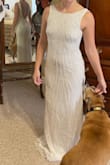 This dress is completely glam and fits so well! I love how light it is; so easy to move around while still looking absolutely gorgeous. And look at that back !!! - Ashlyn M.