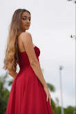 I bought this beautiful, red ball gown not for anything specific, but just to have it for that occasion where you need something classy and elegant like this to wear! I think I will find an opportunity to wear it this holiday season - it is absolutely stunning. I love the fabric, how the top fits, and how it flows majestically with its length. The color also pops incredibly. I can also see myself wearing this for photo shoots, music videos, and live performances as well. Stunning! - Michelle L.