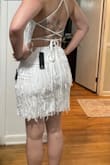This dress was great for a night out! I wore it for a Barbie bachelorette where everyone wore white and the bride wore pink. I'm a little curvy on the bottom so I went with the medium. I have a very small upper body so I was worried, but you can tighten the dress as much as you need. It's a bit short but long enough for short spanx, which was perfect! - Kayla W.