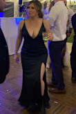 I love this dress! I felt so comfortable all day without a bra, just using fashion tape. I got compliments from so many people, including the seamstress I had hem it for me. Sexy but not trashy. Nice quality. I wore it with combat boots and even a motorcycle jacket at one point. - April T.