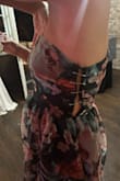 I bought this dress as a bridesmaid dress for my best friend's wedding. I tried it on ahead of time and the zipper was difficult to pull even though there was enough room for it to fit me. On the morning of the wedding, the zipper was completely impossible to zip. The fabric was so thick the zipper could not stay on its track. After an hour of having everyone in the bridal party (including the mother of the groom!) trying to help, I had to just use safety pins to hold it together. This was really disappointing as it was a beautiful dress but just poorly constructed. - Mariah H.