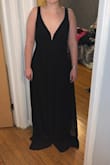 I love this dress! Bought it for a black tie event, and now it's a staple black dress in my closet. The top was fitted but not tight, and everything below the natural waist was loose (which is good for me because I have bigger hips/butt). It was a little long so I had to get it hemmed, but it would probably be okay with taller heels (I wore it with 2-3" heels). I love this dress! - Natalie S.