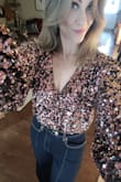 This top is absolutely stunning and so glamorous. The way the sequins hit the light is mesmerizing. So soft and comfortable on the inside, too. I wore it to a daytime Christmas party and dressed it down with dark wide legged jeans and corduroy booties. I am so happy I bought this top!! - Amy S.