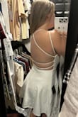 The dress is really comfortable although I'm not a huge fan of the one strap that goes around your arm (see photo). The underlining is a little short for my booty personally, but it's cute and snug! I love the really low back as well. I'll be wearing this for either my bachelorette or rehearsal dinner, and I will be bringing it with me on my honeymoon for good measure - Tristen T.
