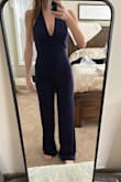 Super cute jumpsuit. It fits true to size. I wore it with heels and it was the perfect length. Very comfortable and flexible material. Great for dancing! - Kalean B.