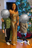 I bought this on a whim as it was suggested as something I might like. I bought for a company Christmas party with a Disco band! It fit amazingly, it was comfortable and the amount of compliments I received was very flattering! I am on the shorter side so I did need to hem the bottoms. I can't wait to find a reason to wear this again. - Amanda M.