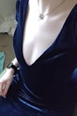 The dress fits very well and the v cut is perfect. I'm a bit short for the dress so I would've had to hem it but I'm returning it as I had purchased 2 dresses for multiple options for the event. I'm obsessed with the top part and the color and would also purchase the same dress again if it were short like a cocktail dress. - Rory C.