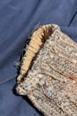 I liked it, but the sleeves started falling apart on the first night wearing it. I only wore it for a few hours and now there are a bunch of strings at the end. For $100, I would have expected better quality - Brittaney R.