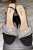 These shoes are very pretty in person, almost true to size. I ordered a half size up, and it fit perfect. However, after one wear (for about 4 hours in an inside event), the top piece to the heel came off. I feel they should have more durability for the price. - Heather G.