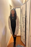 I'm in love with this sweater. It is very warm, soft, and comfortable as well as stylish. It's perfect for layering. Definitely buy it. It runs very large. For an oversized fit stick to your regular size for a more fitted look go down 1-2 sizes. I'm 5'2 174 curvy and got an XS. - Maia Q.