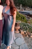 I love this dress and would buy it in every color if I could. Used some double-sided tape to hold it in place on my shoulders and around my chest, and it was great! The downside is that it is satin and easily shows liquids/sweat and stains. But this is a very thick and high-quality fabric. Would have loved this in white as well if they had it! - Jessica P.