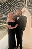 I wore this to a black tie event for work and got so many compliments! Had I not waited until the last minute, I might have had it tailored just so that I didn't need to wear heels taller than 3" to ensure it didn't drag. It had some stretch to it and had no issues with it falling down. - Annalece A.