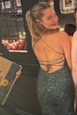 I loved this dress and thought it fit very well. The lace up back really cinches your waist and makes the whole dress fit very well. It was a bit long but worked out with heels. I would definitely recommend buying! - Taylor T.