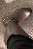These boots look super super chic and expensive. The leather and coloring look and feel high end, and the metal details, which can often look cheap, are subtle and high end looking. The shoe runs true to size. It is comfortable enough to walk around in the city. Overall a great price for a boot that is really sophisticated and perfect for many different occasions. - Jessica G.