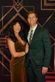 This dress is so fancy but also so comfortable! I had first ordered a small, but I wanted a more snatched look, and being on the shorter side, the size small was too long on me all over. The dress has some nice stretch to it, so I ended up being very happy in the XS. My husband wore a green suit and I loved the combo of these colors together. For this low cut dress, I definitely recommend a plunge-style bra and some fashion tape for extra confidence. - Tara C.