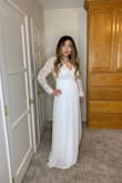 You feel like a princess in this dress.  The long sleeve details are amazing, the open back is fun and you just feel so pretty in it.  Waist area is a tad tight. - Gregory L.