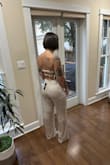 I bought this to wear to the dinner of my destination wedding in Barbados on Christmas Eve. This outfit is very comfortable, has a lot of stretch and fits great. The top stays up! It is pretty long, I didn't have much time so I used fabric tape to hem the length which worked perfectly. I ordered a medium, but it was too big. I have lost some weight recently and I am in denial of what size I am lol I can't wait to wear this in a few days after I get married!!! - Nicole W.