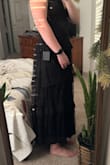 The shape was flattering, but for a wedding guest it was not the right vibe, really screamed Addams family with the sleeves and not the elegance the pictures made it seem like. I'm 6" and the dress sat above my ankles so too short for me. Also not sure if it was because of my height but where one ruffle landed below my hips so it made me look wide. - Dorothy-Faye S.