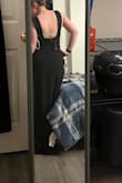When I first saw this dress I was still deciding on what to wear for my New Year's Eve party (Casino Royale themed!). Suddenly the small was out of stock so I frantically used the sizing chart and immediately bought a medium. It fits perfectly, very comfortable, makes my bust look stunning, and the mid-low back is flattering. The only con is that the dip in the neckline is stiffly wired so it will not bend. - Marcy B.