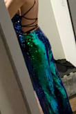 This jumpsuit fits like you custom tailored it to my body.   The unique multi green sequins hit the light from all angles.  My favorite part of this outfit is that the length of the pants can be functional with flats or heels/ boots.  I will wear this statement jumpsuit to diverse events in the future. 5 stars! - Vanessa B.