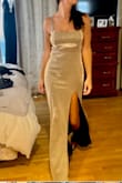 Purchased this dress for a black tie occasion and wanted something other than black. The dress is very nice, fabric is good with little to no stretch. If you're in-between sizes go for the bigger one. I think this dress looks best with a little room. - Sandra V.