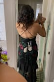 I was so pleased this had some stretch and was a comfortable fabric instead of being itchy. It fits perfectly and went through the wash just fine as well. The back is easy to zip and easy to tie. - Kara S.