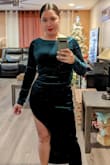 I wore this dress for a Christmas party. It is a very beautiful color. The slit it pretty high, but I wore some black spandex shorts under to make me feel more comfortable with the dress. It is stretchy. The quality is great. - Anailee M.