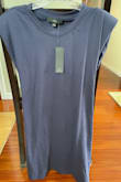 (Update to my review below: Customer service emailed to let me know they have proactively refunded me for this. I am touched, surprised, and extremely grateful. Thank you, Lulus!) Navy blue looks faded. Shoulder pads look strange and obvious when hair isn't down covering the area. These dislikes are minor compared to the fact that the dress smells like laundry detergent - as if it has been washed (and maybe) worn. It's a final sale so I can't return it. Can't even exchange them because they are sold out. Super disappointed with the purchase. - Tas S.