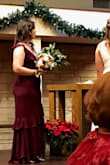 I love this dress, and I got so many compliments from friends and family. The wedding ceremony was in a church, so I would say this dress is conservative enough but the ruffles add a fun flare to it. It is a little long but I had to order a size up since Medium was sold out. I think a Large felt nice around [the] stomach and hips; not too tight. However, it was slightly long and the same for the straps, so it seemed more low cut than I'd like. Overall fit well, no one could tell I had to buy a size bigger. I'm in between medium and large (medium top, large bottom). - Katelyn M.