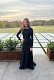 I bought this dress to wear at a formal wedding and got so many compliments. My favorite parts of the dress were the deep cutout in the back and the train. The top was a little snug around the bust but this size fit well otherwise. My only wish would be that the sleeves would have been a little longer because I have long arms but overall it was a great fit and I would definitely recommend it! - Jessica D.