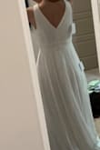 I liked this dress but definitely too long in the torso and hem for me. It didn't quite give wedding vibes, but it was simple and pretty. Good deal. - Emily B.