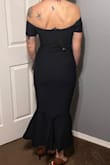 The dress is beautiful! It compliments your curves and keeps everything tucked in nicely. I'm usually a size small but luckily I ordered and xs and it fit perfectly! I'm happy with the quality and durability of the dress, especially for the price! - Kate F.