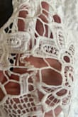 The dress is beautiful and fits perfectly but, the fabric is too delicate and rips so easily. The dress arrived with some rips. - Blanca L.