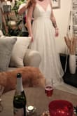 It's beautiful and feels so soft and comfortable. I almost picked it for my wedding but went with a fancier style. - Adri M.