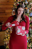 Flattering, bold, and perfect for the holidays. As a tall lady, it can be hard to find clothes that fit well. I love this dress. So many compliments. A slight note is the arms are a bit short but I have very long arms so it will probably fit most other tall ladies. - Kenzie R.