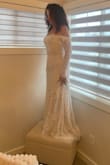 This dress is gorgeous and true to size. The only thing I would change is the lace on top front, and the lining to be attached at the bottom. Don't be afraid to buy this one. - Jenn R.