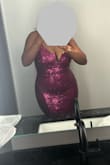 I wore this to NYE and got lots of compliments. It's very comfortable for moving around in and the slit wasn't too high (I wore shorts just in case). My only issue is the straps are too thin to hold the bust up properly so it does shift a little. It's not wardrobe malfunction bad, but for a bigger bust I definitely recommend tape for the girls. - Naomi K.