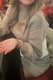 This dress is so warm & cozy. I would say was a bit loose but I wouldn't size down. I got my normal size. - Kimberley S.