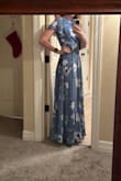 My sister asked me to order this as a bridesmaids dress for her wedding. The dress fit perfectly, with a gorgeous cut-out in the back and a subtle slit down the leg. The dress is romantic and so perfect for the day. I'm glad I'll be able to wear it after too! - Brittany I.