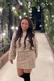 I love this dress! The material is soft and comfortable. The style is super cute, and I got a lot of compliments on it. - May T.