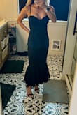 This dress was a perfect blend of some sexy and classy! For reference, I'm 5'0 and 99 pounds, 32C, and was worried the dress would be too long or loose around the waist but this dress surprisingly fit perfectly around my waist and chest! My favorite area is the corset bodice. Very flattering! It was a bit long but didn't have time to get it hemmed. It worked out fine with 4-inch heels! This will be a keeper for future evening events! - Mae G.