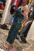 Dress is very pretty, sequin detail was not itchy at all either. This dress ran large, the material is rather stretchy and not so form-fitting so it made my stomach look larger than it is. I usually wear a medium, in Lulus and the small was still a bit large. - Danielle R.