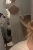 Gorgeous style, but the fabric is very thin and the dress is sheer. Too short-waisted for this long torso girlie. Photos are screen grabs from a video attempting to show the fabric pulling and how sheer it is. Might be a great fit for someone with a straighter/more narrow body type! - Julia