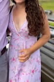 Wore this to my sister's summer wedding. Really pretty. Flowy and lightweight! The tie-back helps adjust the size. The only downside was the top seam near the bust wouldn't lay flat, it would fold over. Maybe my boobs aren't big enough? Or maybe it's the fabric? Going to take it to a seamstress to see if it can get fixed. Quality is great for the money, but not the best overall. Really pretty though and got tons of compliments!! - Courtney V.