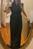 I was worried how this would look because I have a belly after two kids. It hides my stomach well, makes my waist look small, and my butt look great if I do say so myself. It is tight in spots such as the sleeves and a little in my mid section. It's also very difficult to zip up and unzip by yourself. Its forest green but looks gray in certain lighting. I plan on wearing this to a January wedding as well as my college graduation in May. Overall, very happy with my purchase. - Krista M.